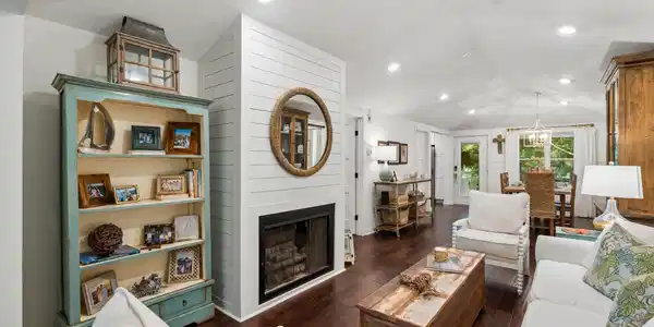 Image 4: Gather around the wood-burning fireplace