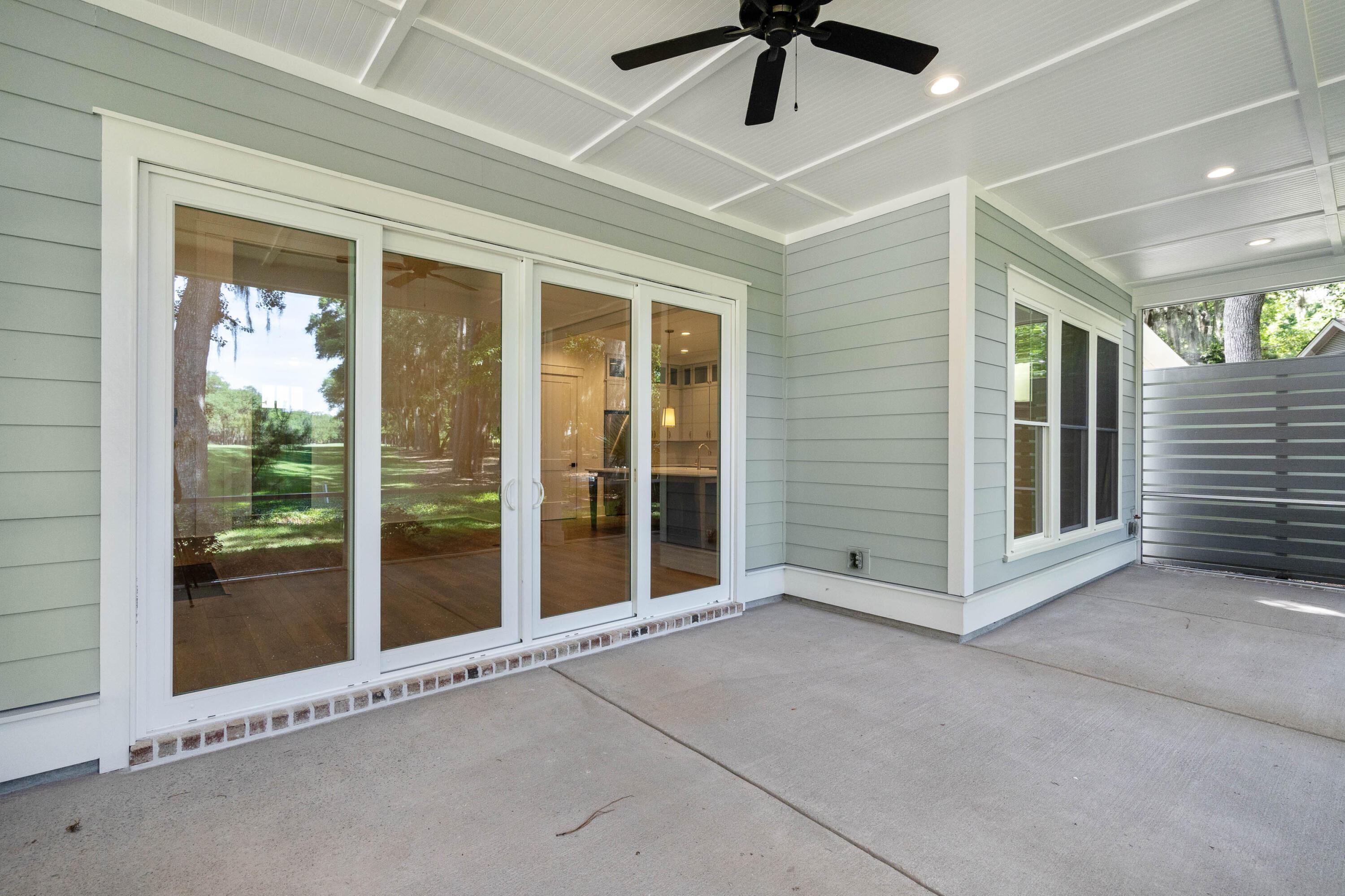 Image 3: Screened in back porch.