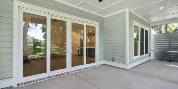 Image 3: Screened in back porch.