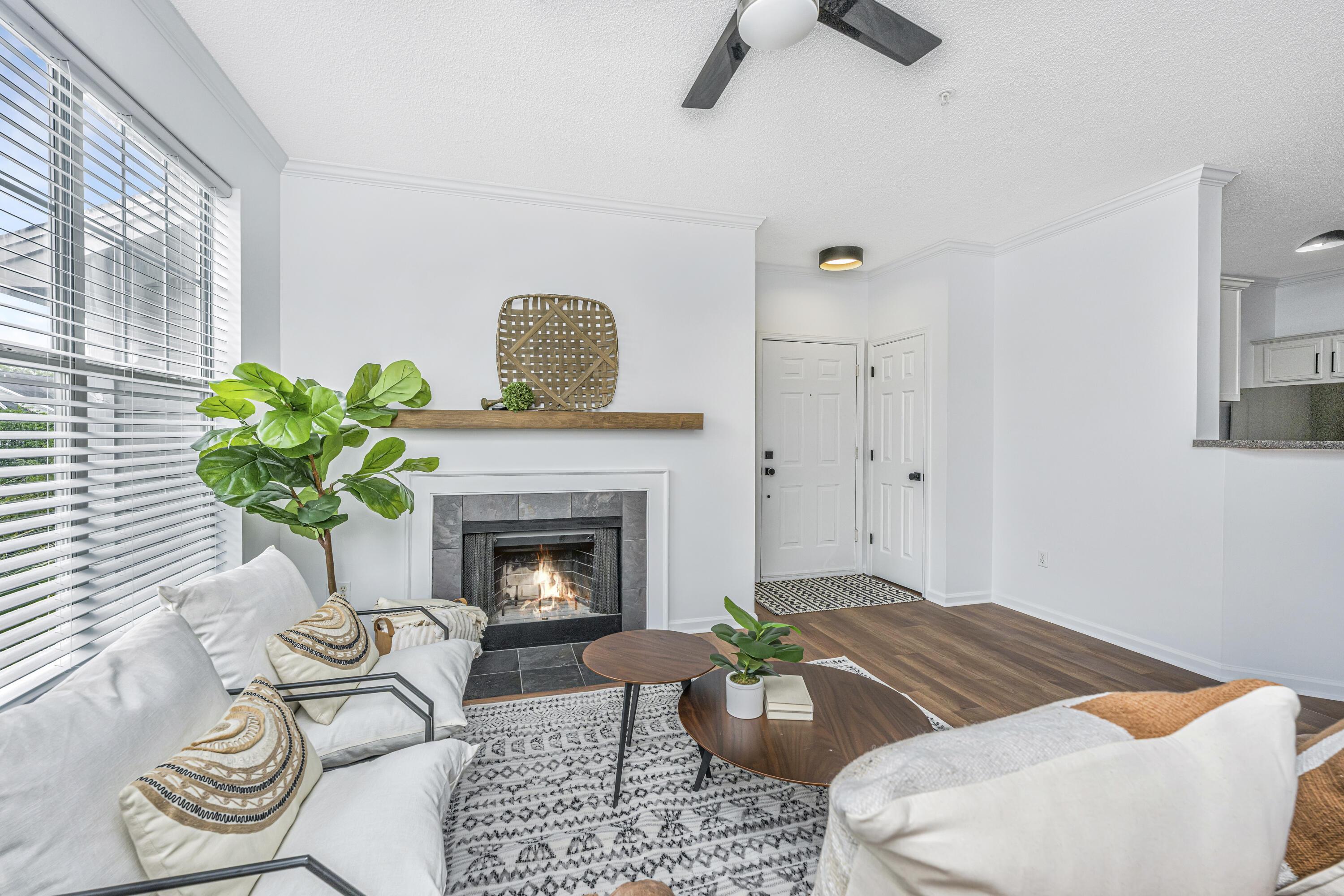 Image 3: Family room w/wood burning fireplace