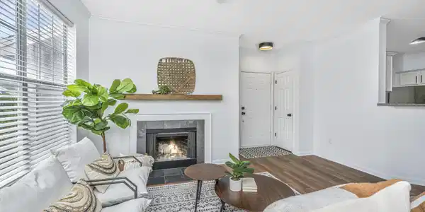 Image 3: Family room w/wood burning fireplace