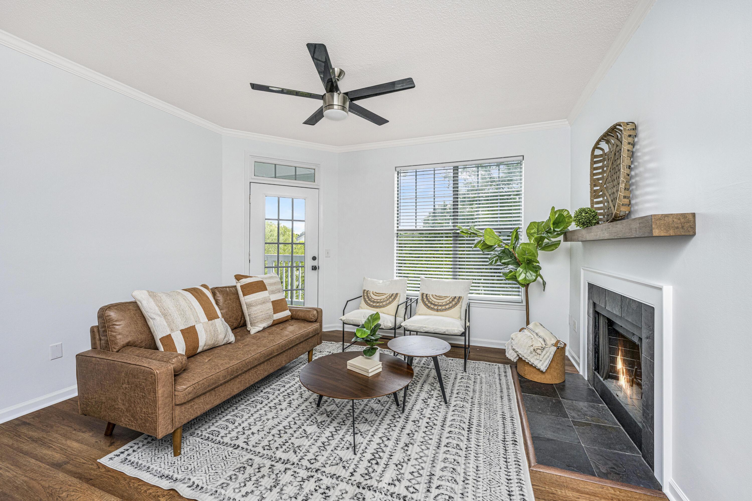 Image 4: Family room w/wood burning fireplace