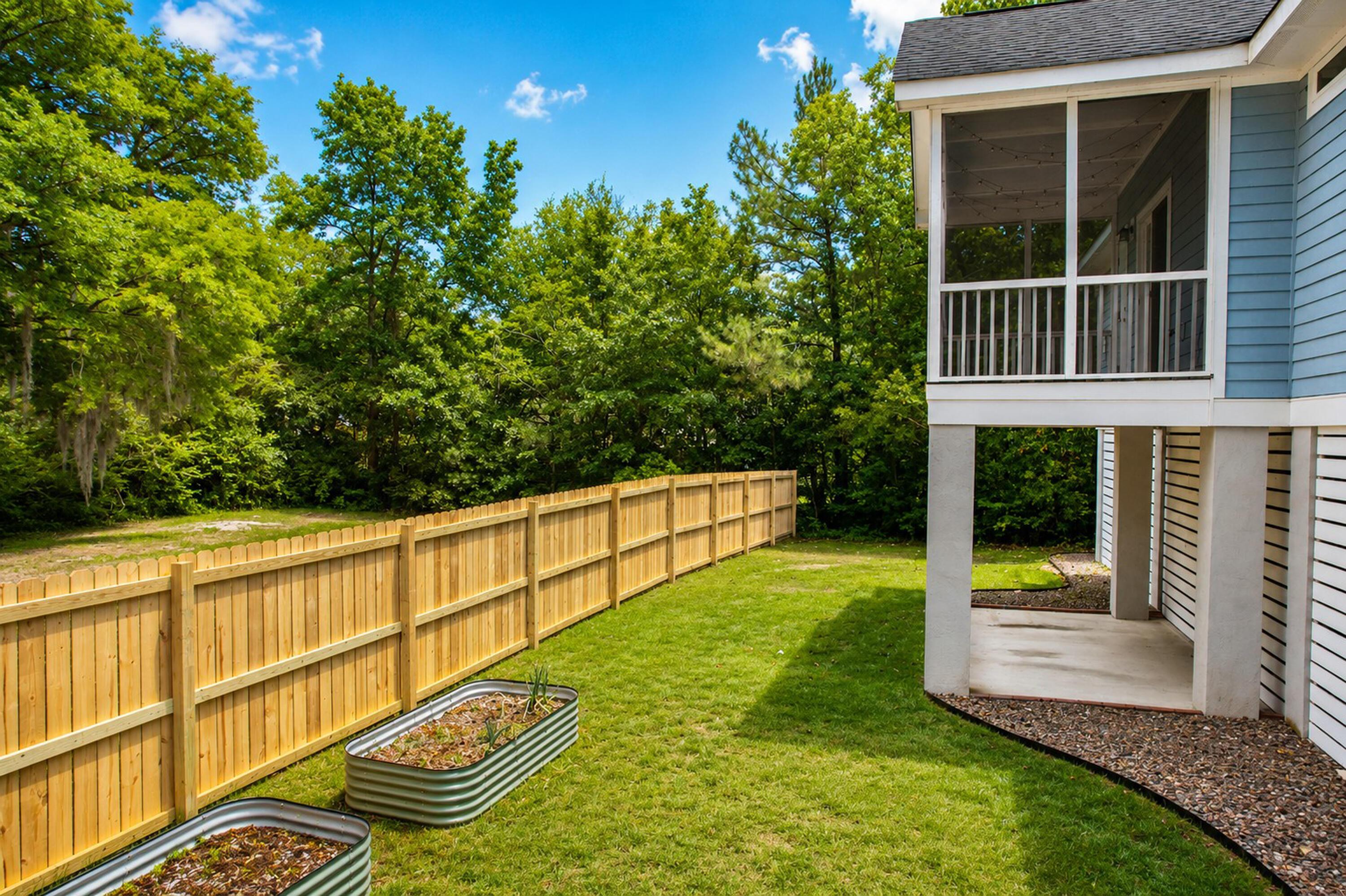 Image 3: New fence along in back yard