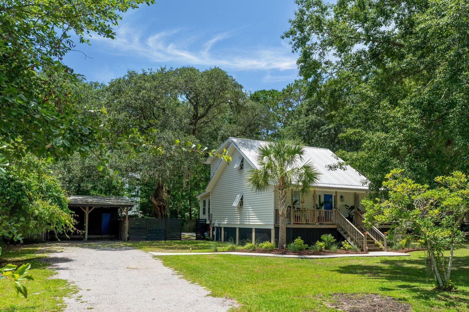 Image 4: Front angle with driveway