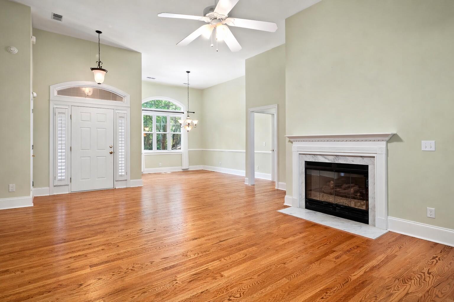 Image 3: Open living room and dining room