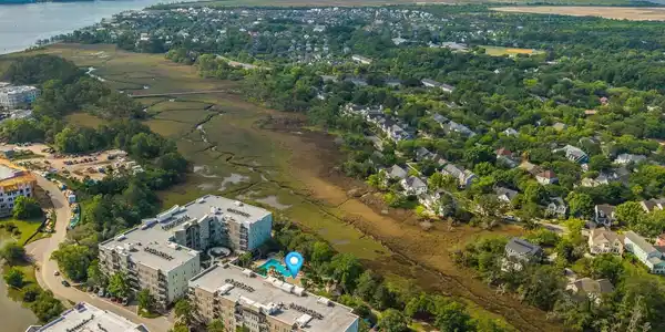 Image 2: Top Floor Views of Pool and Marsh
