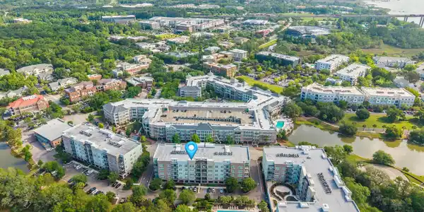 Image 3: Top Floor Views of Pool and Marsh