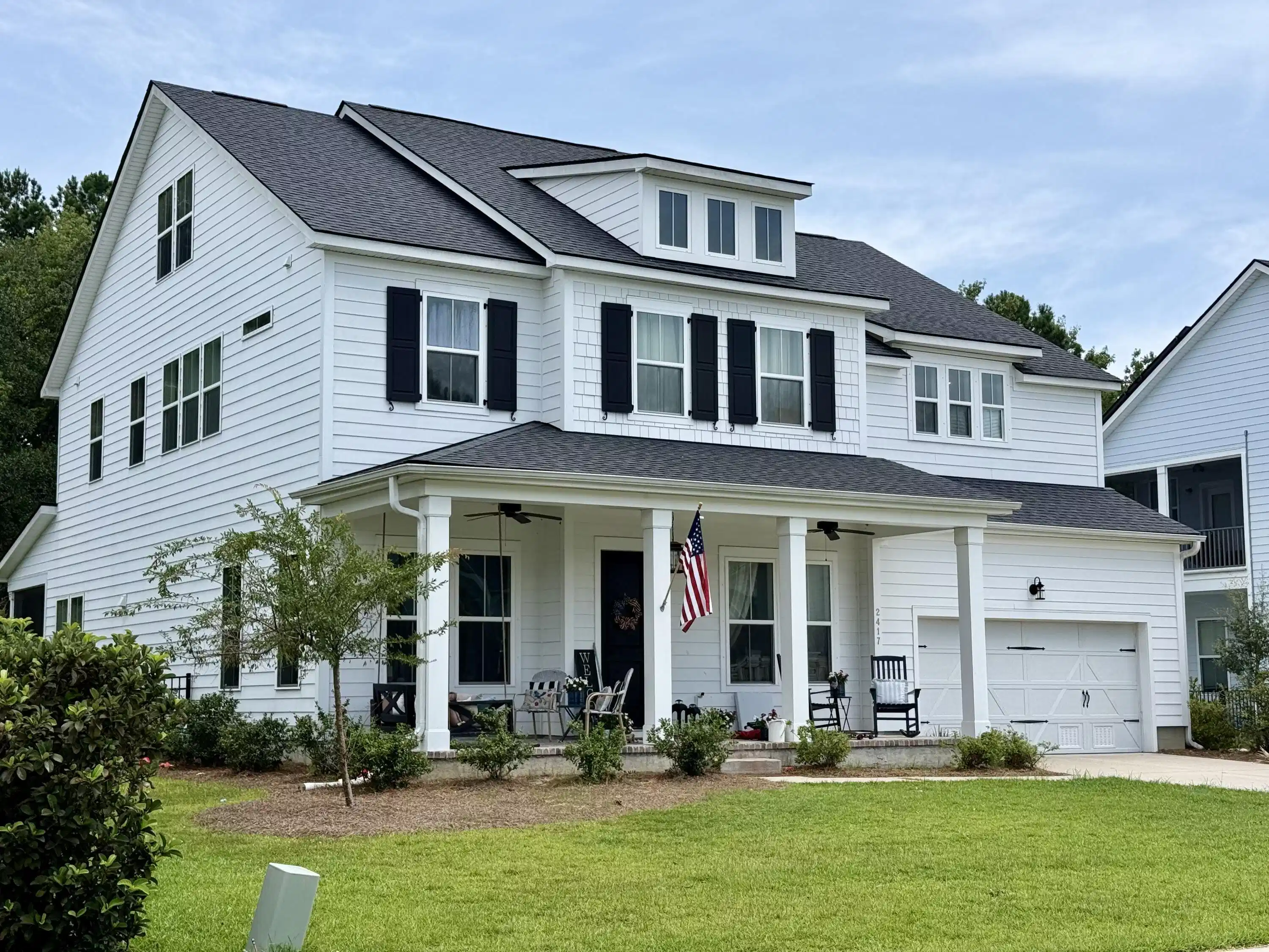 Image 1: Exterior of similar home