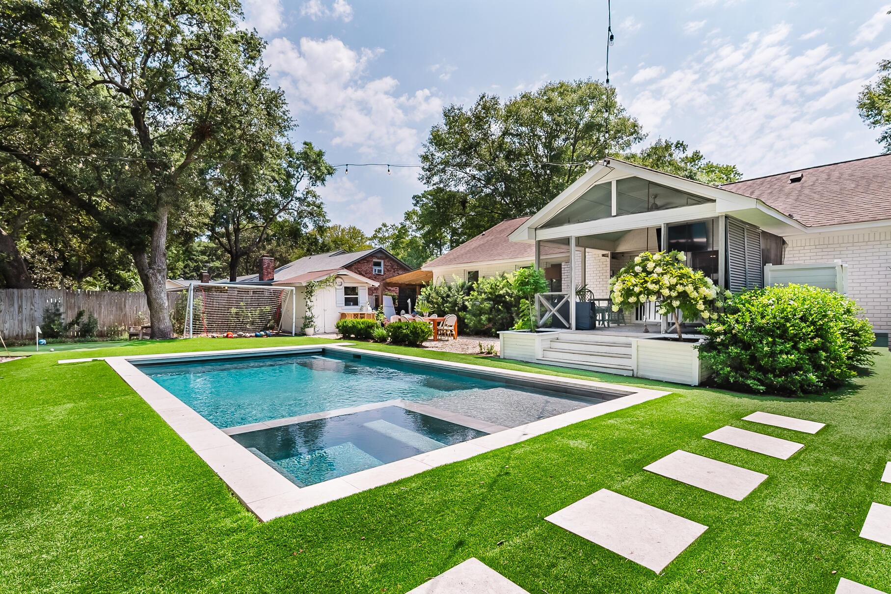 Image 1: Backyard looking at house