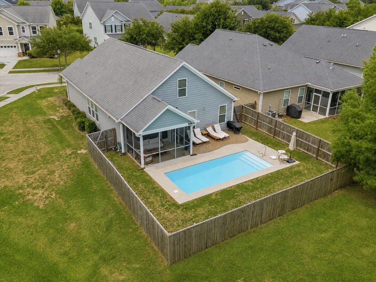 Image 3: Aerial Saltwater Pool and Screened Porch