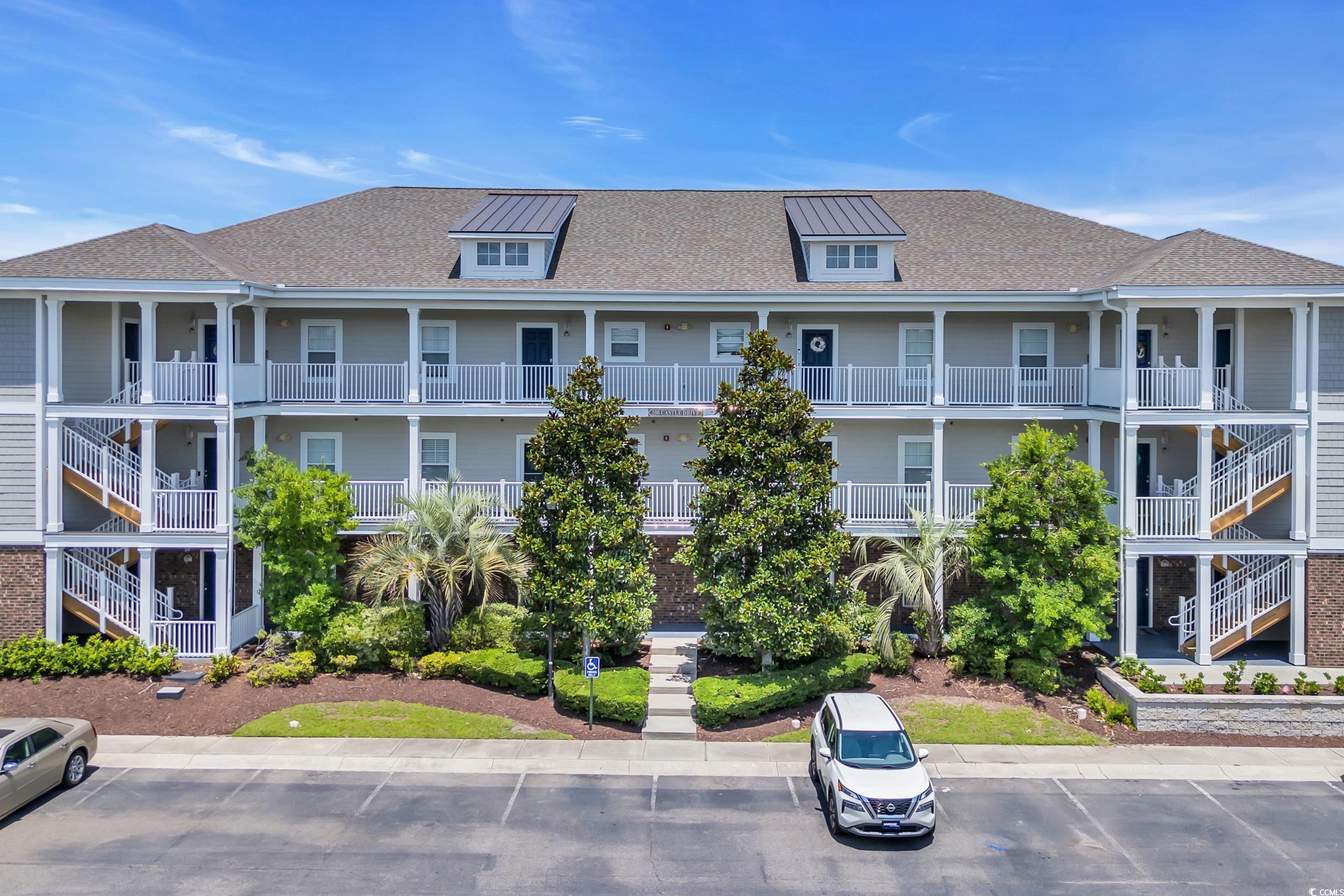 Image 2: View of apartment building / complex featuring unc Image 2: View of apartment building / complex featuring unc