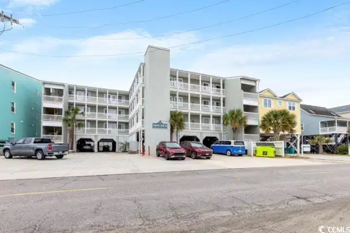 Image 1: View of apartment building / complex with uncovere Image 1: View of apartment building / complex with uncovere
