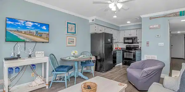 Image 4: Living area featuring ornamental molding, light wo Image 4: Living area featuring ornamental molding, light wo