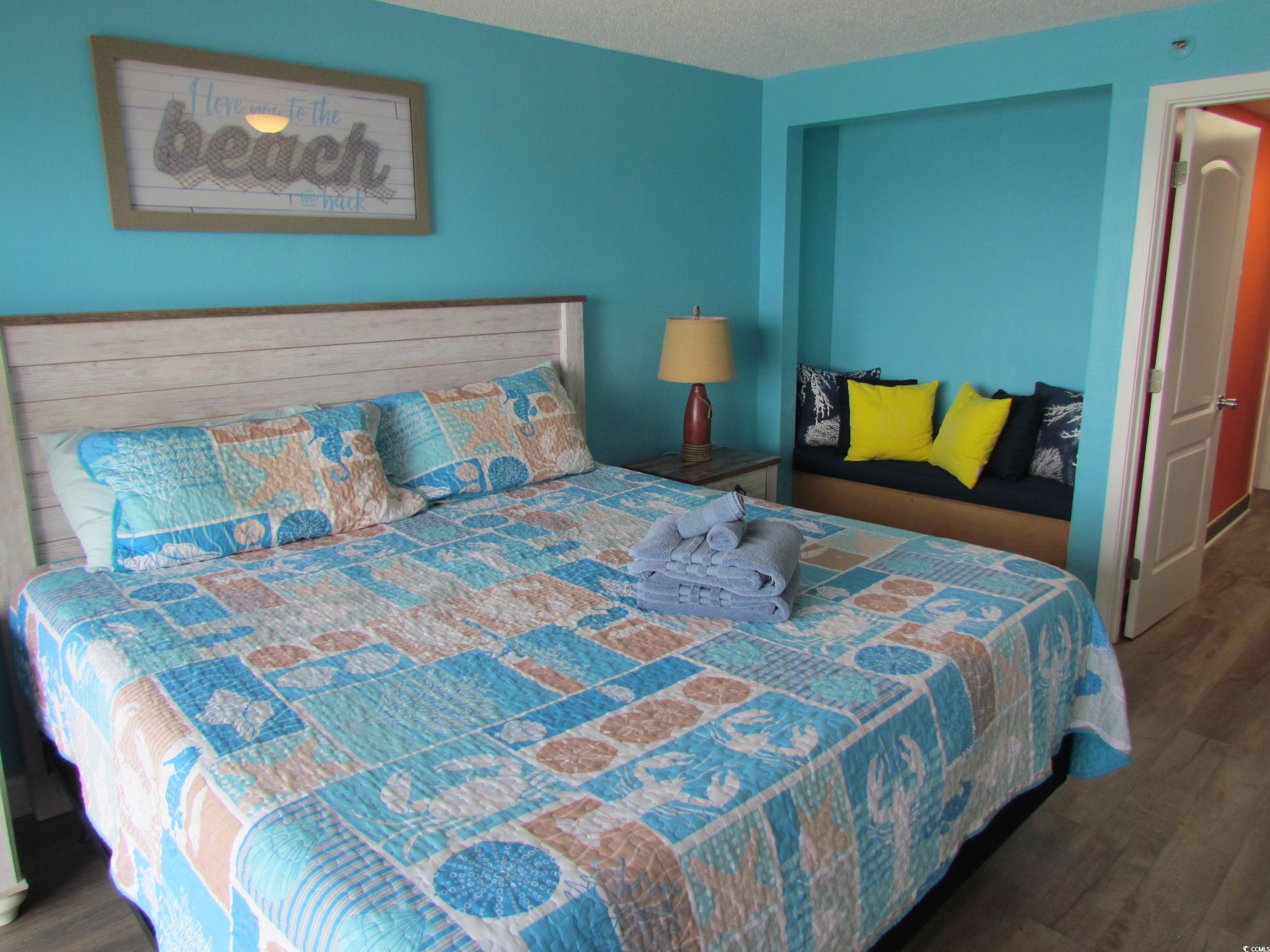 Image 2: Bedroom featuring wood finished floors Image 2: Bedroom featuring wood finished floors
