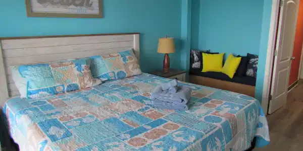 Image 2: Bedroom featuring wood finished floors