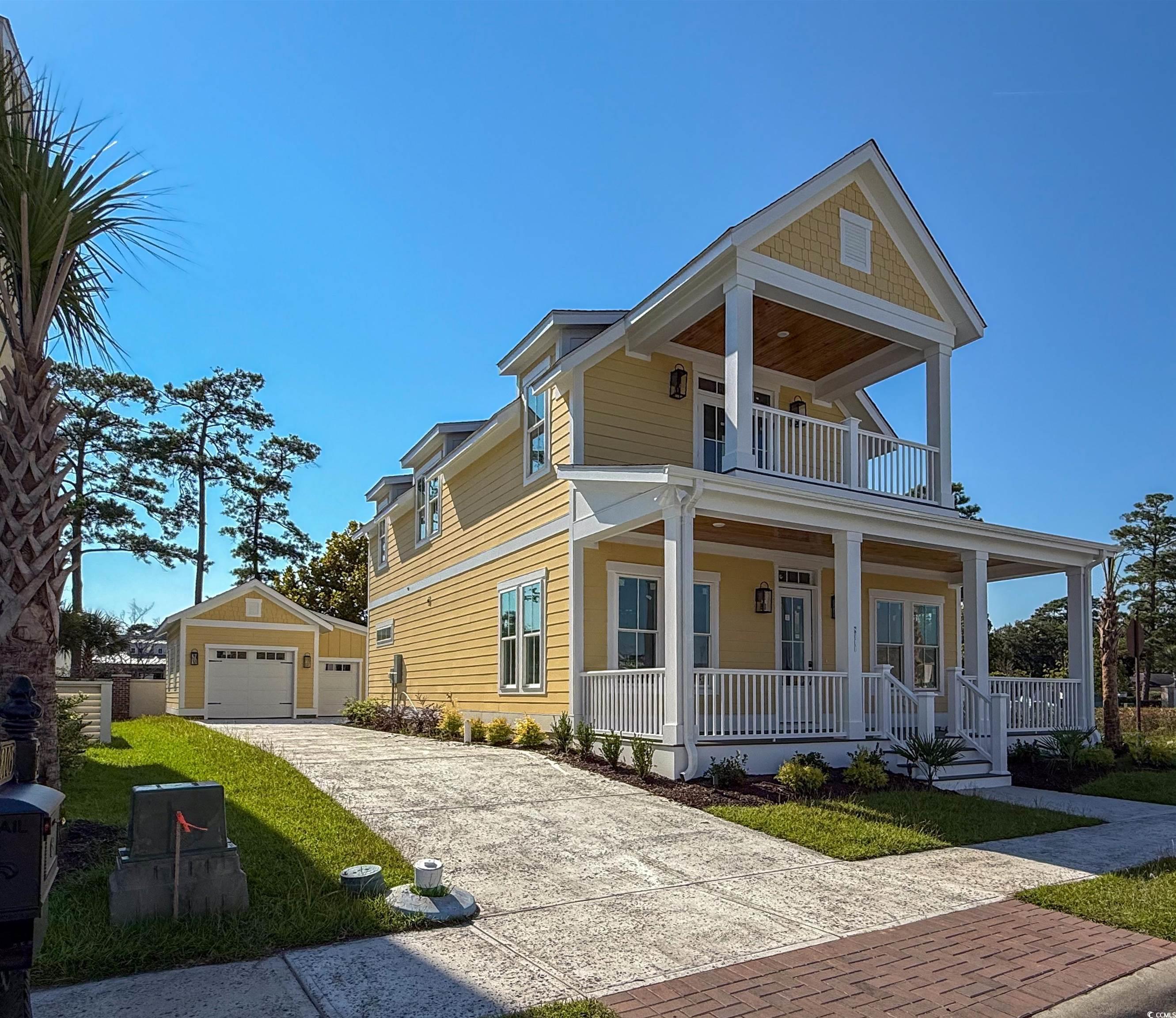 Image 2: View of front of property with a porch, an outdoor
