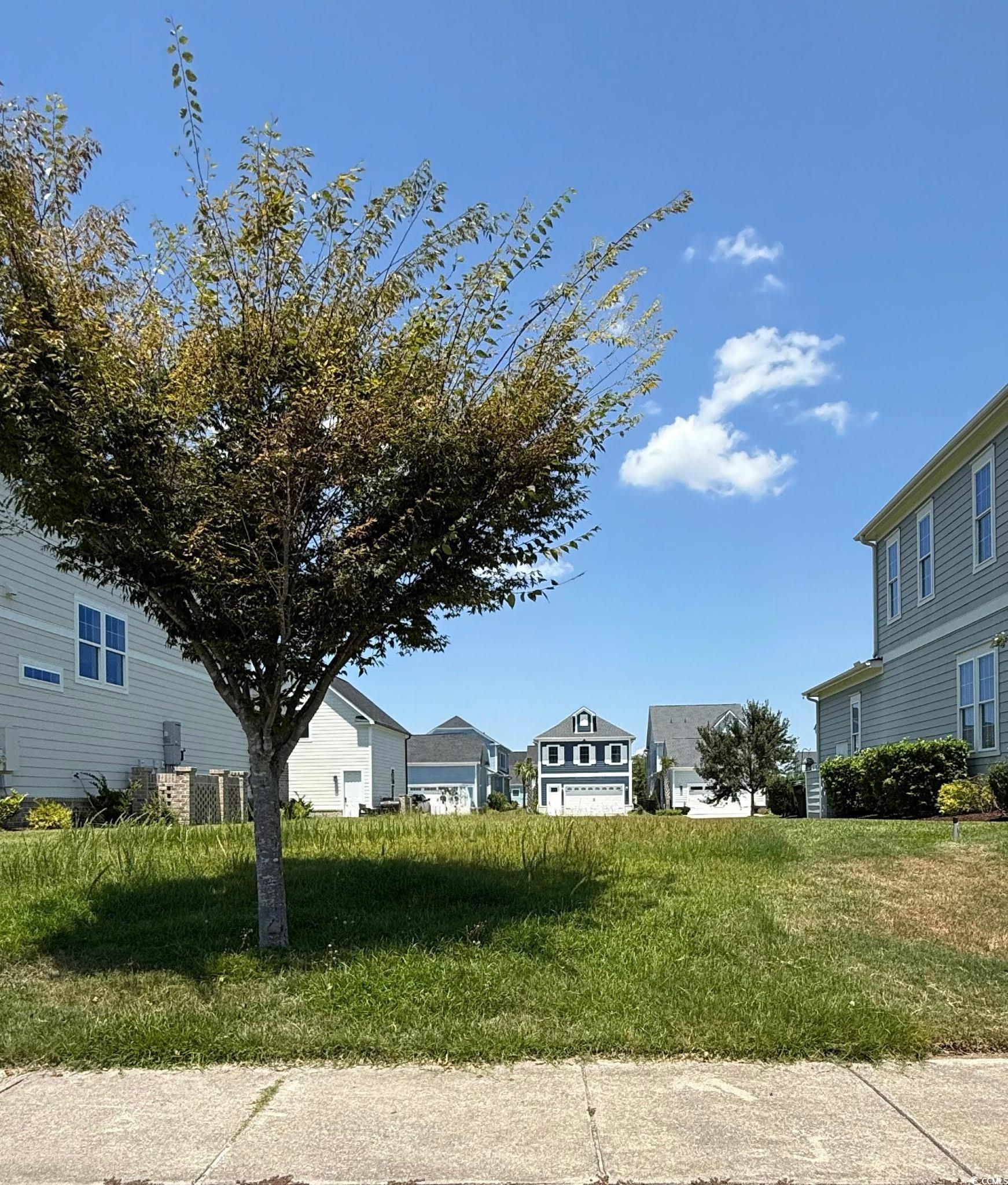Image 2: View of yard featuring a residential view Image 2: View of yard featuring a residential view