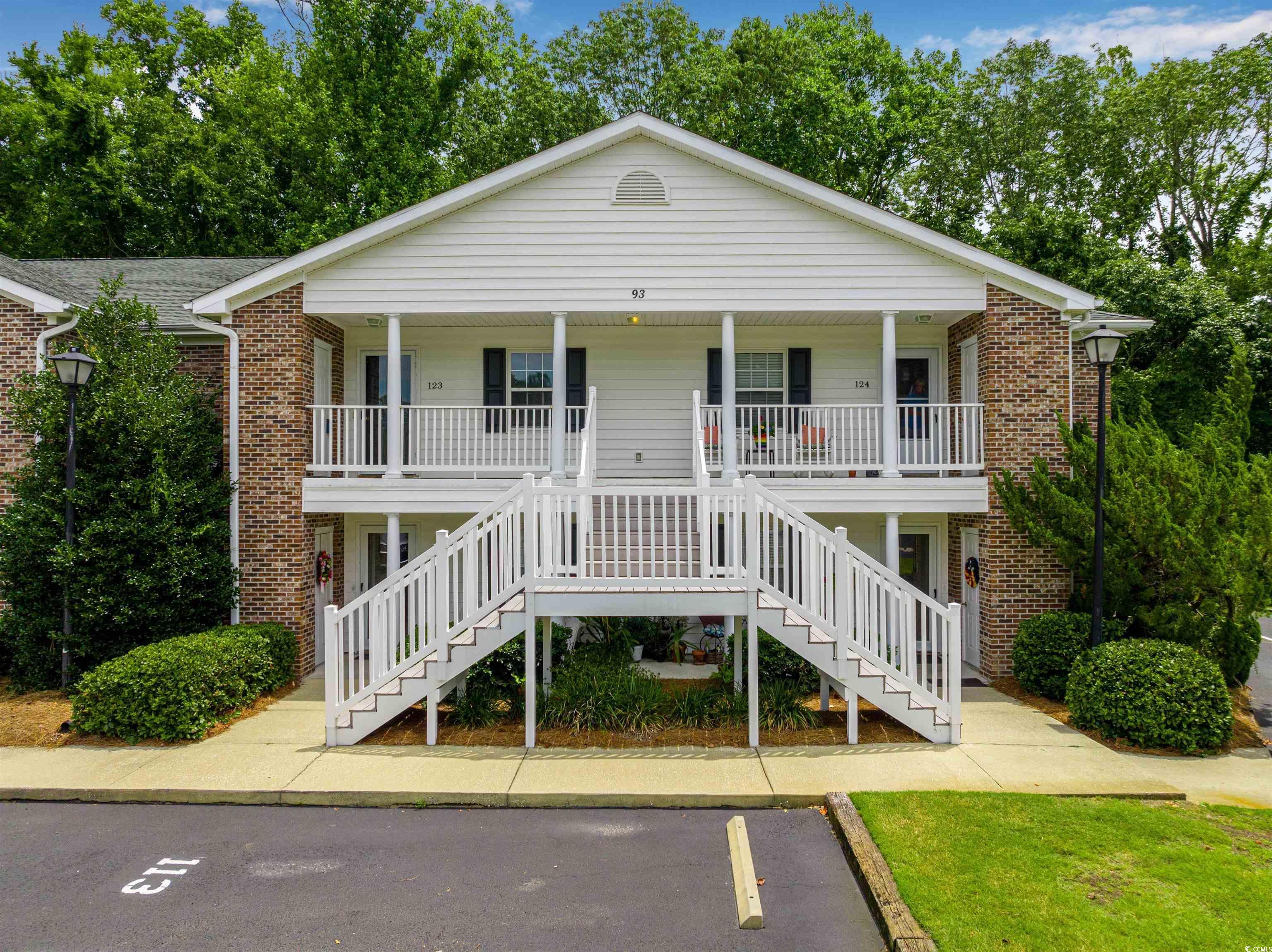 Image 1: Coastal inspired home featuring covered porch, bri Image 1: Coastal inspired home featuring covered porch, bri