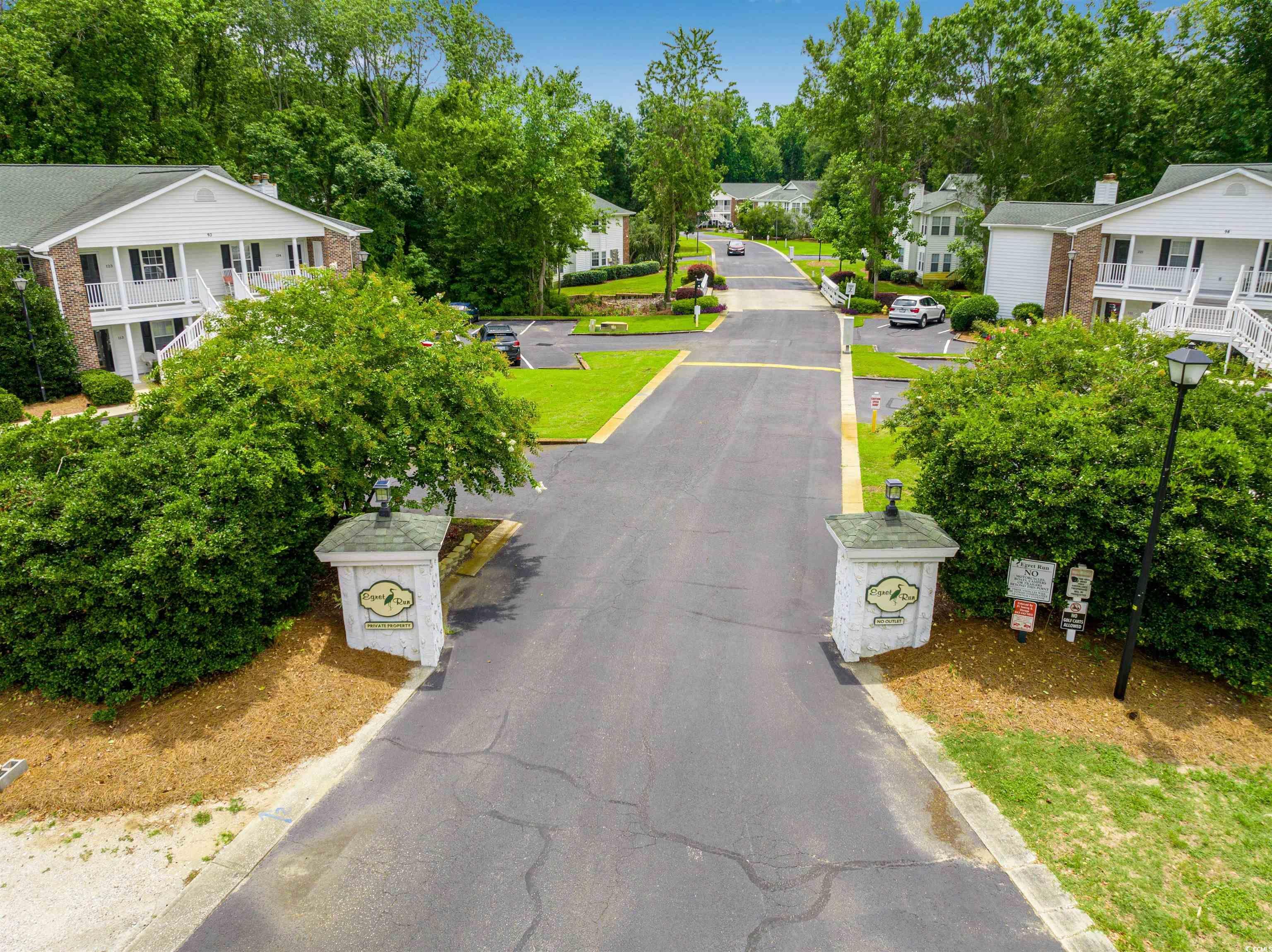 Image 3: View of asphalt street featuring a residential vie Image 3: View of asphalt street featuring a residential vie