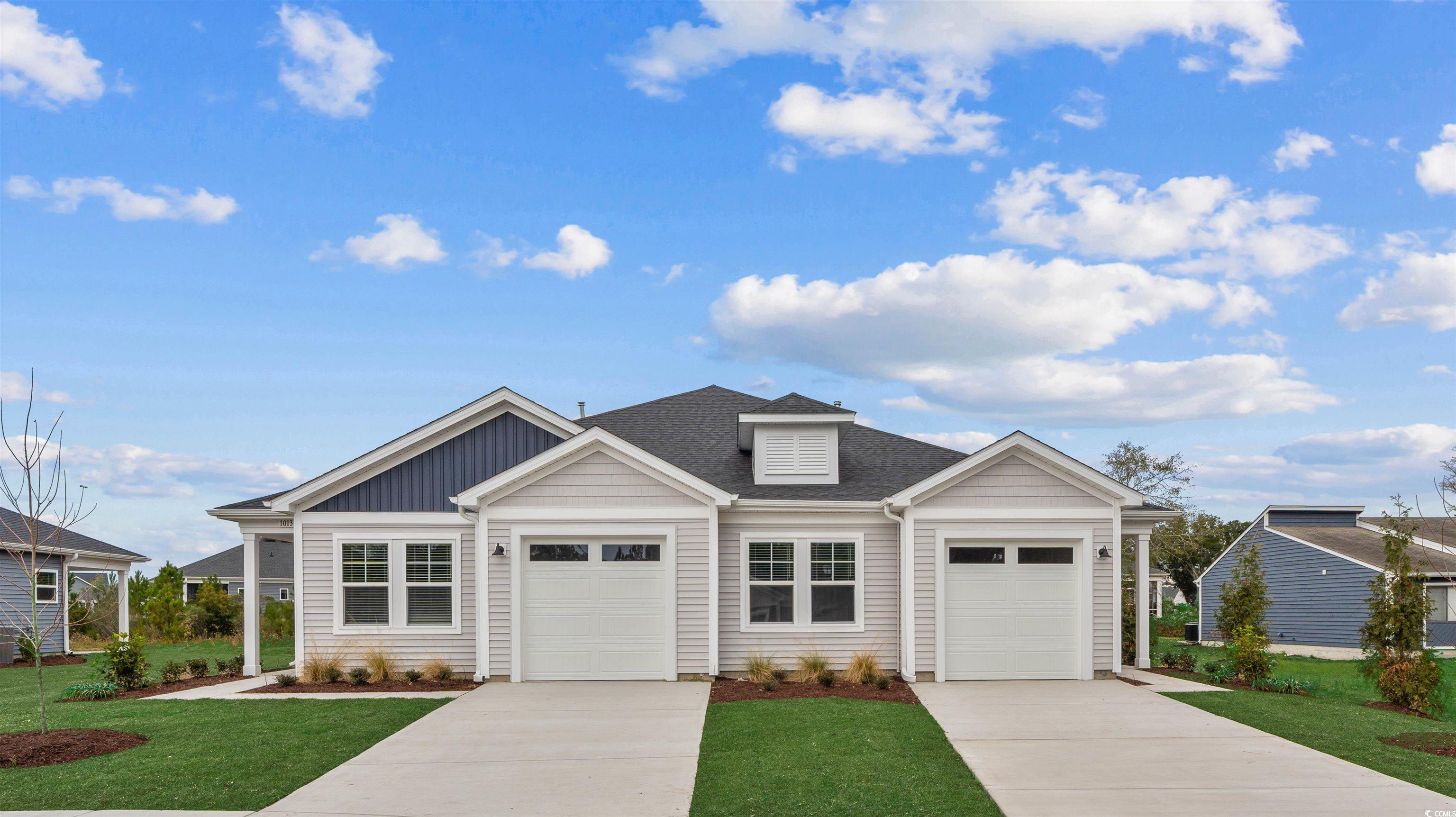 Image 1: Ranch-style house featuring a front yard, driveway