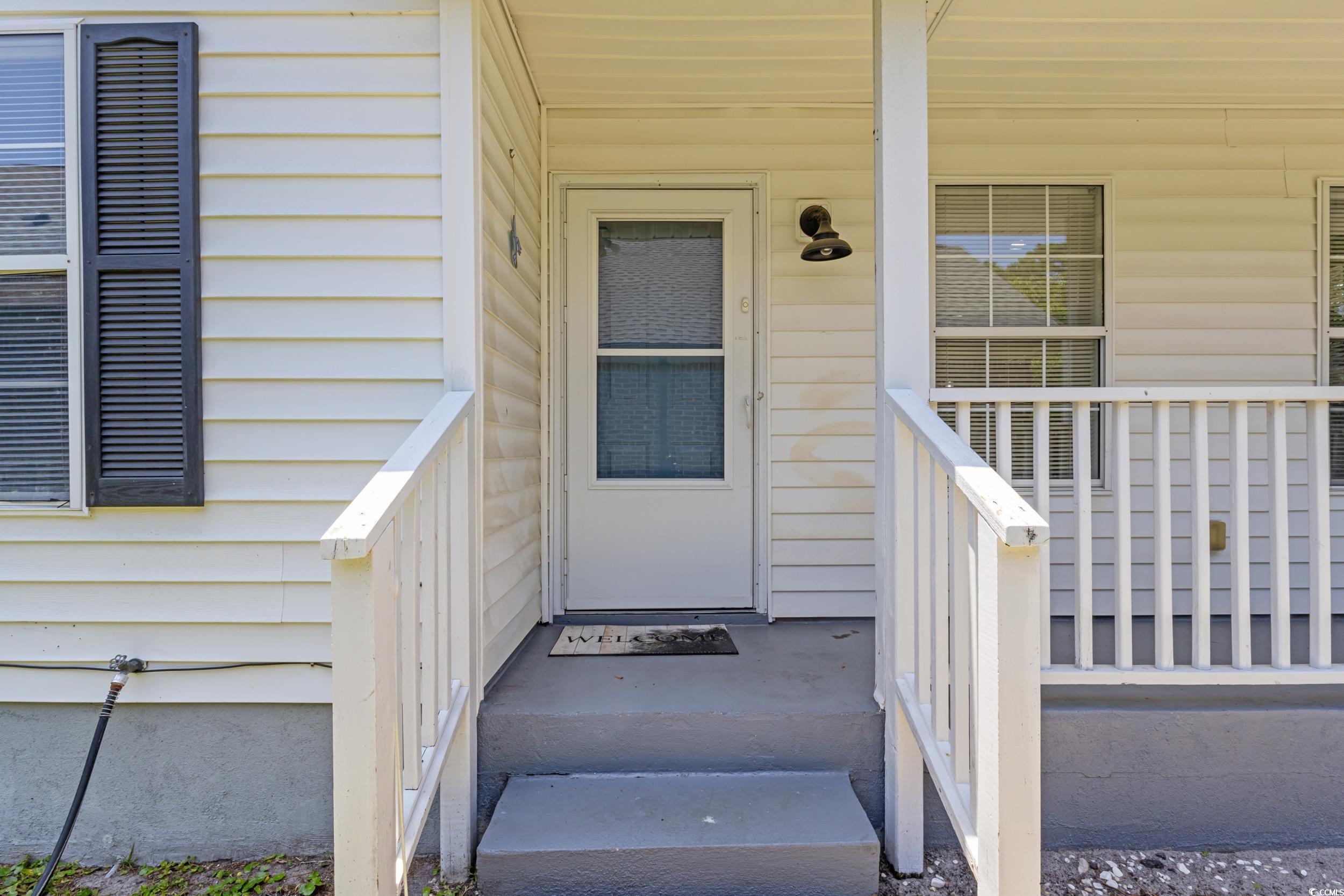 Image 2: View of exterior entry featuring covered porch Image 2: View of exterior entry featuring covered porch