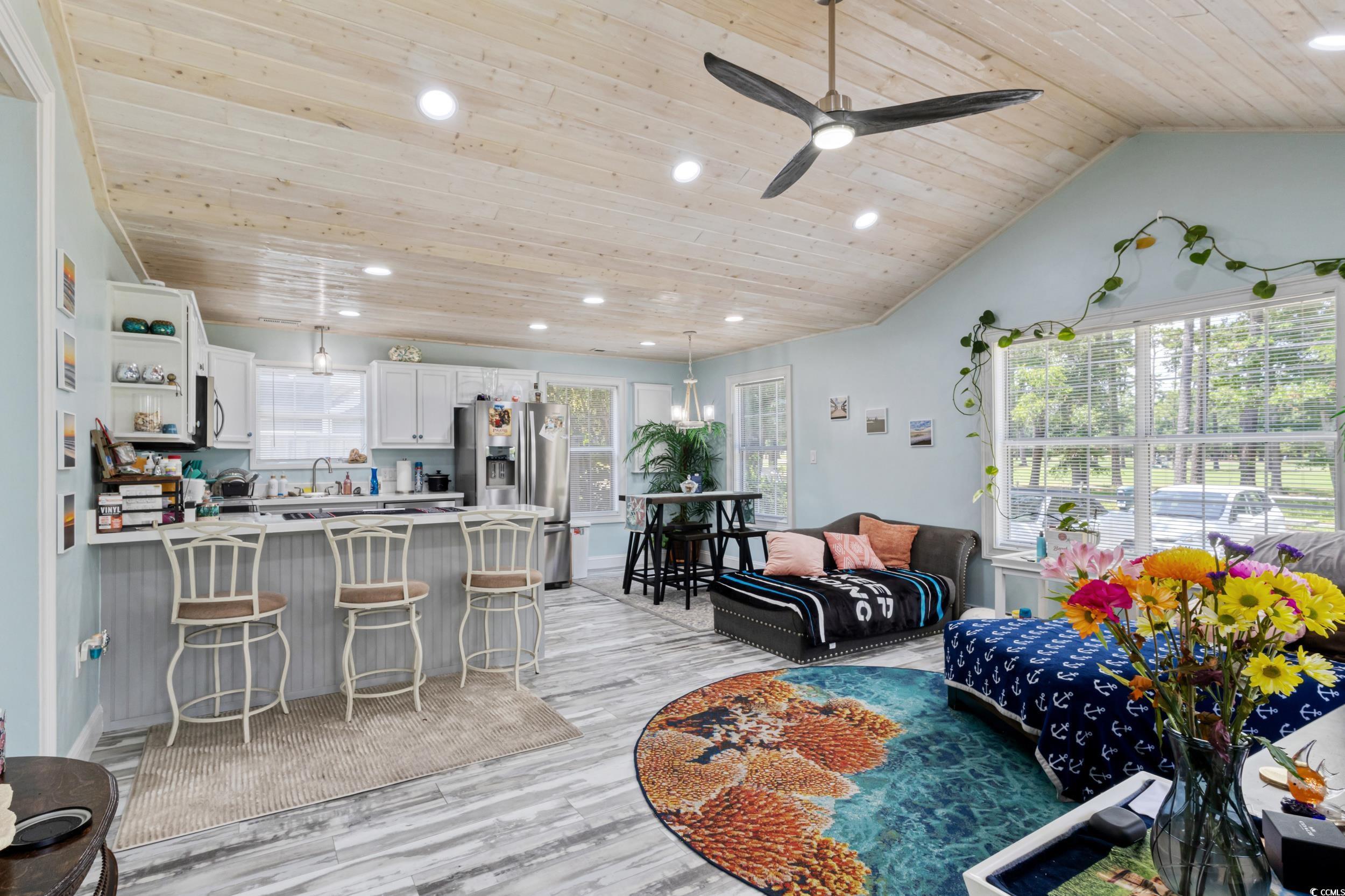 Image 4: Living area featuring wood ceiling, recessed light Image 4: Living area featuring wood ceiling, recessed light
