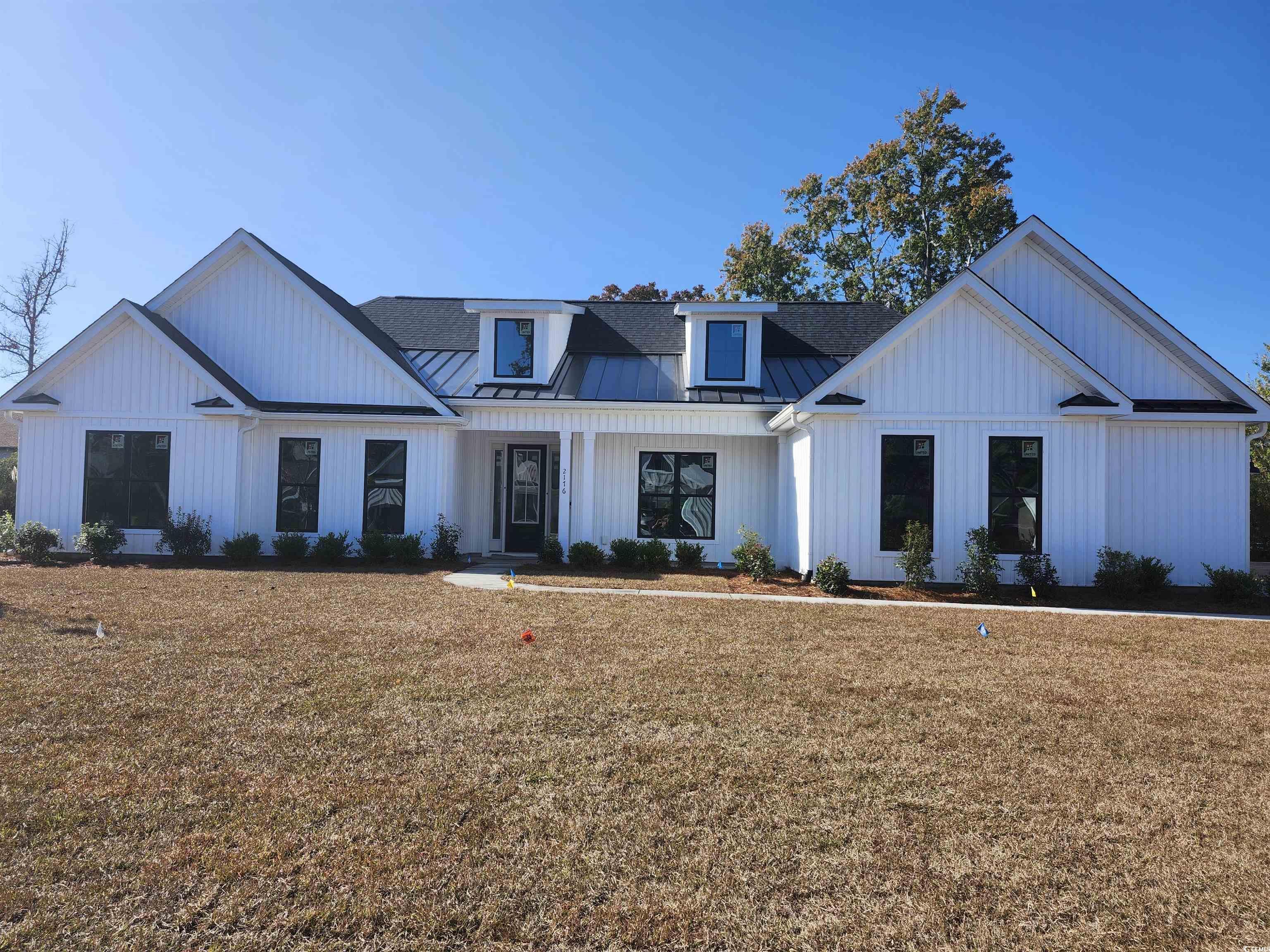 Image 1: Modern inspired farmhouse featuring a standing sea Image 1: Modern inspired farmhouse featuring a standing sea