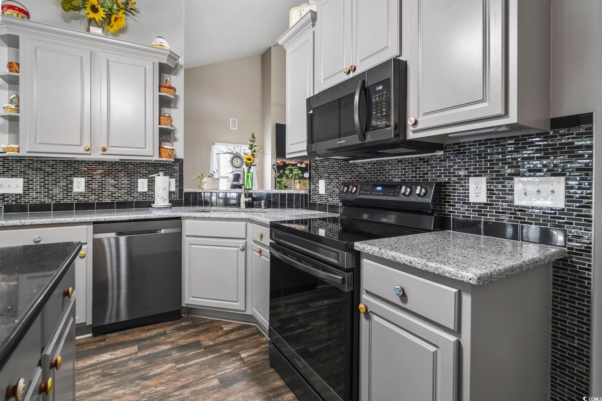 Image 3: Kitchen featuring open shelves, black appliances, Image 3: Kitchen featuring open shelves, black appliances,