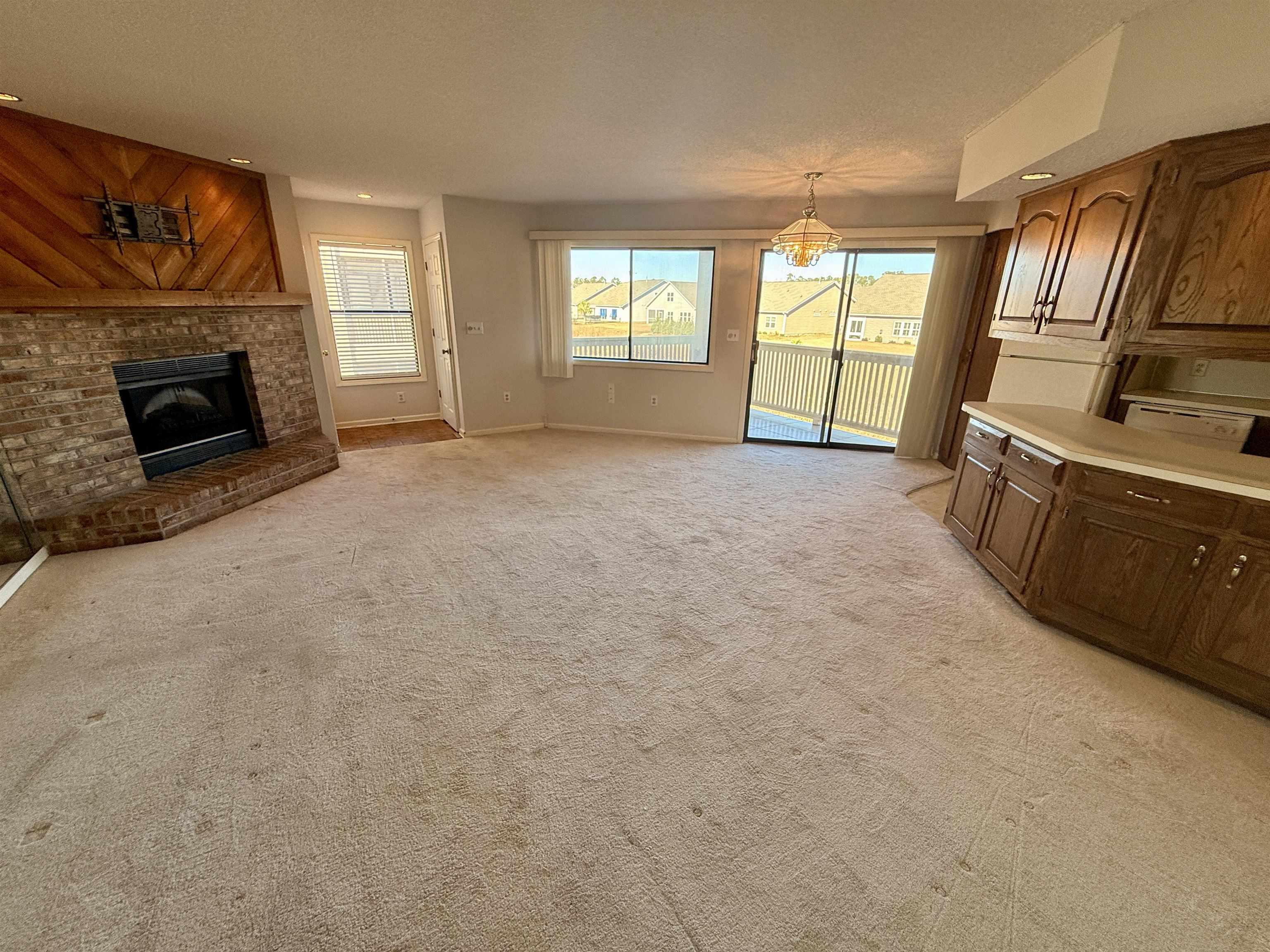 Image 2: Unfurnished living room featuring healthy amount o