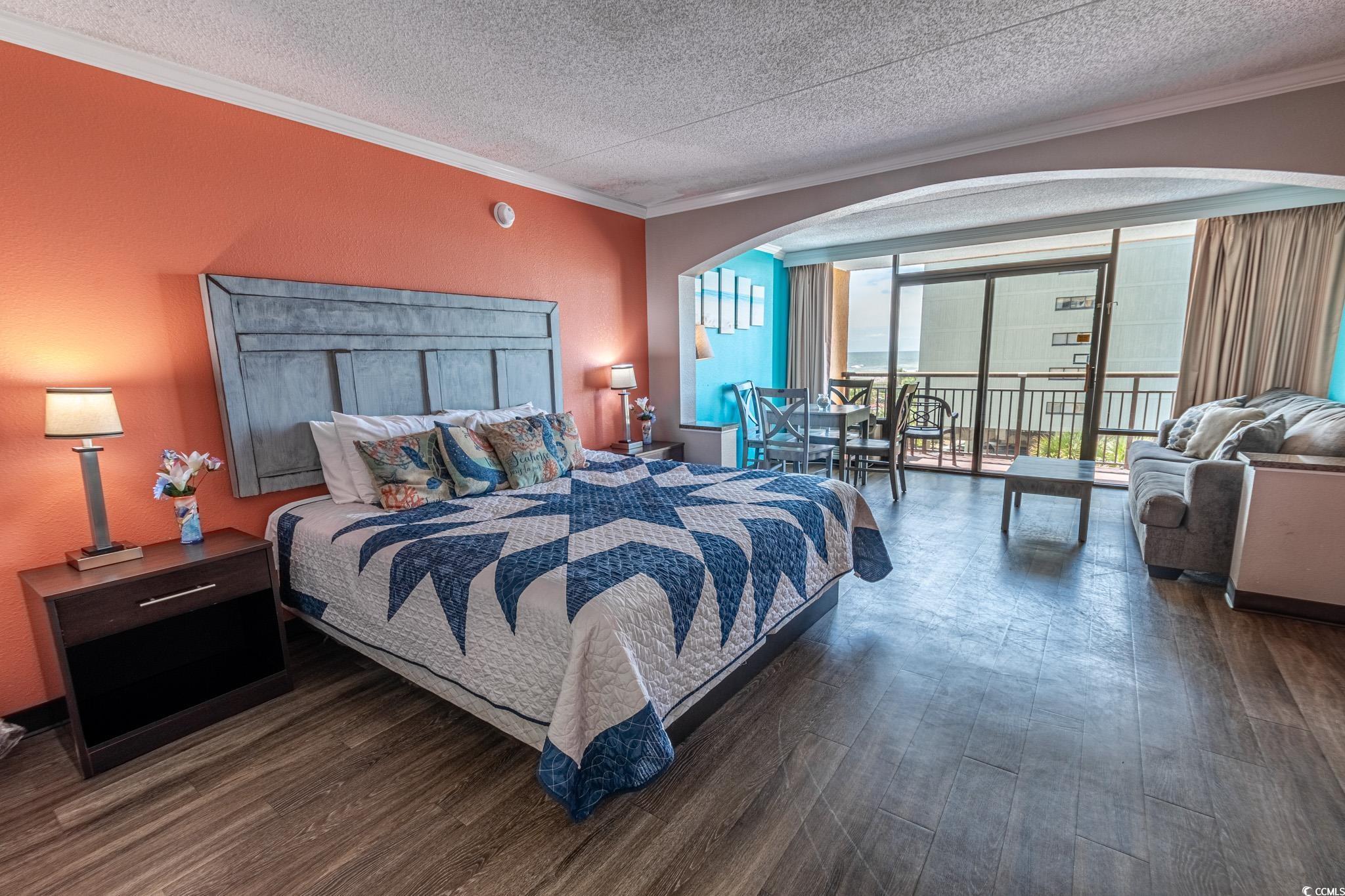 Image 4: Bedroom featuring dark hardwood / wood-style floor Image 4: Bedroom featuring dark hardwood / wood-style floor
