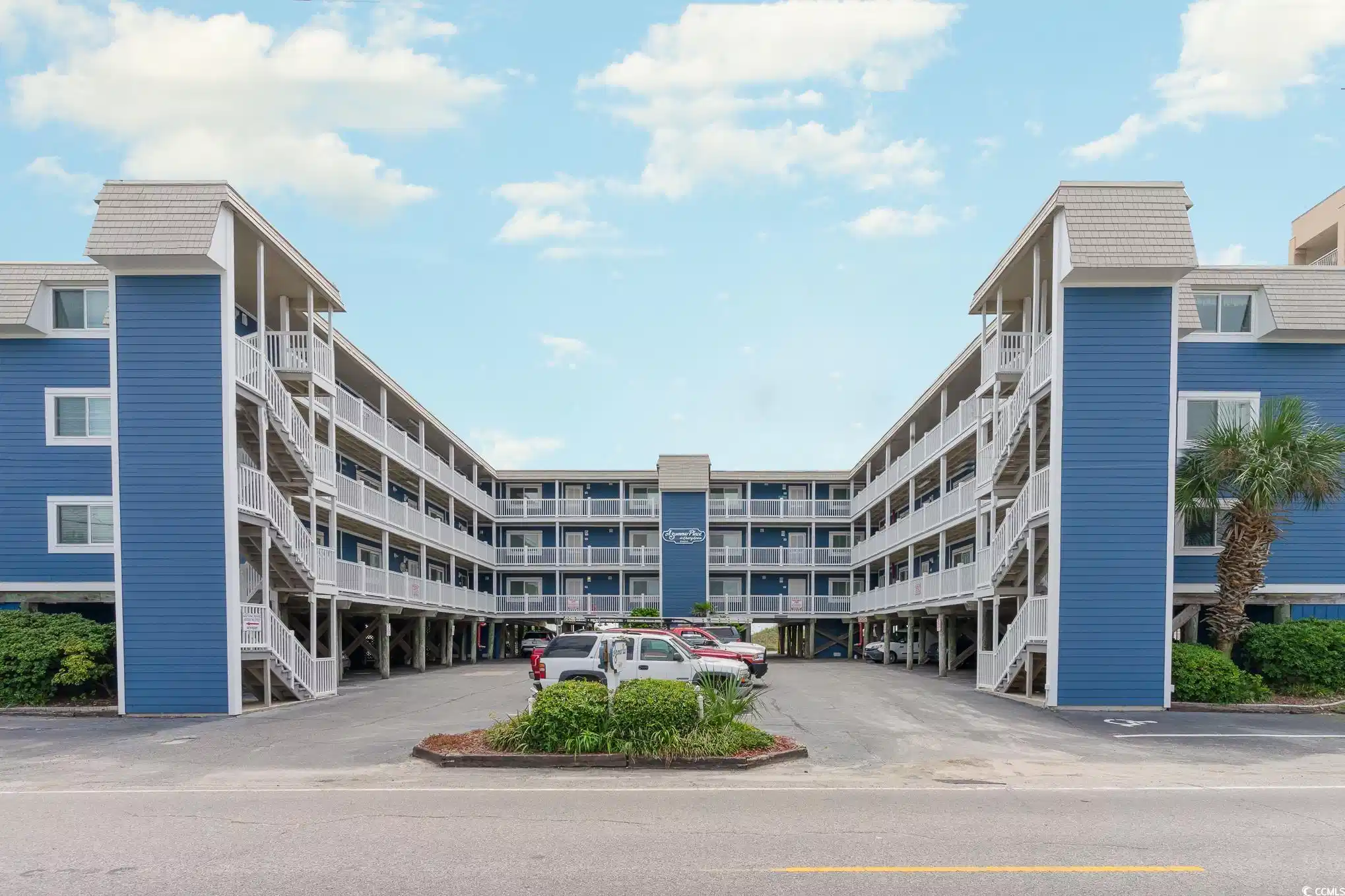 Image 1: View of property featuring uncovered parking