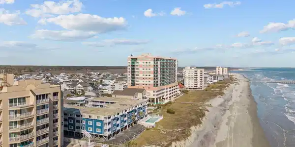 Image 2: Birds eye view of property with a water view and a