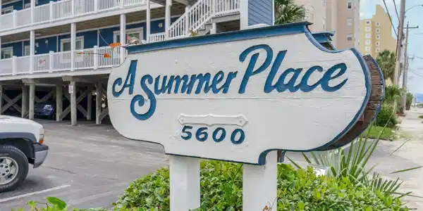 Image 3: Community / neighborhood sign with uncovered parki