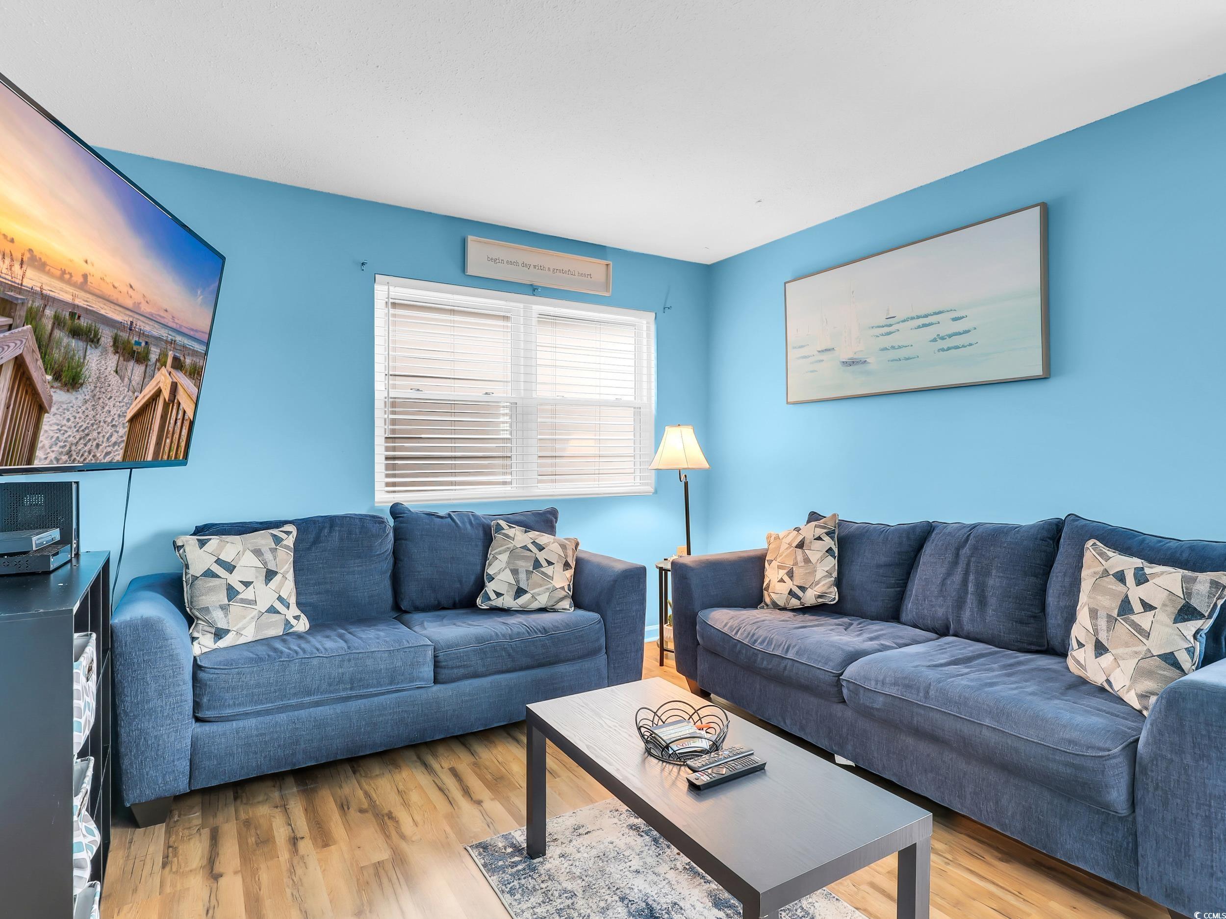 Image 2: Living room featuring wood finished floors Image 2: Living room featuring wood finished floors