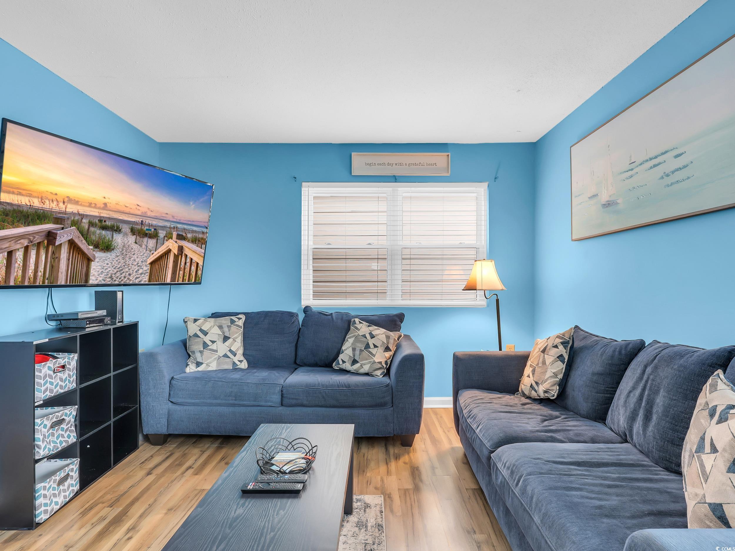 Image 4: Living room featuring wood finished floors Image 4: Living room featuring wood finished floors