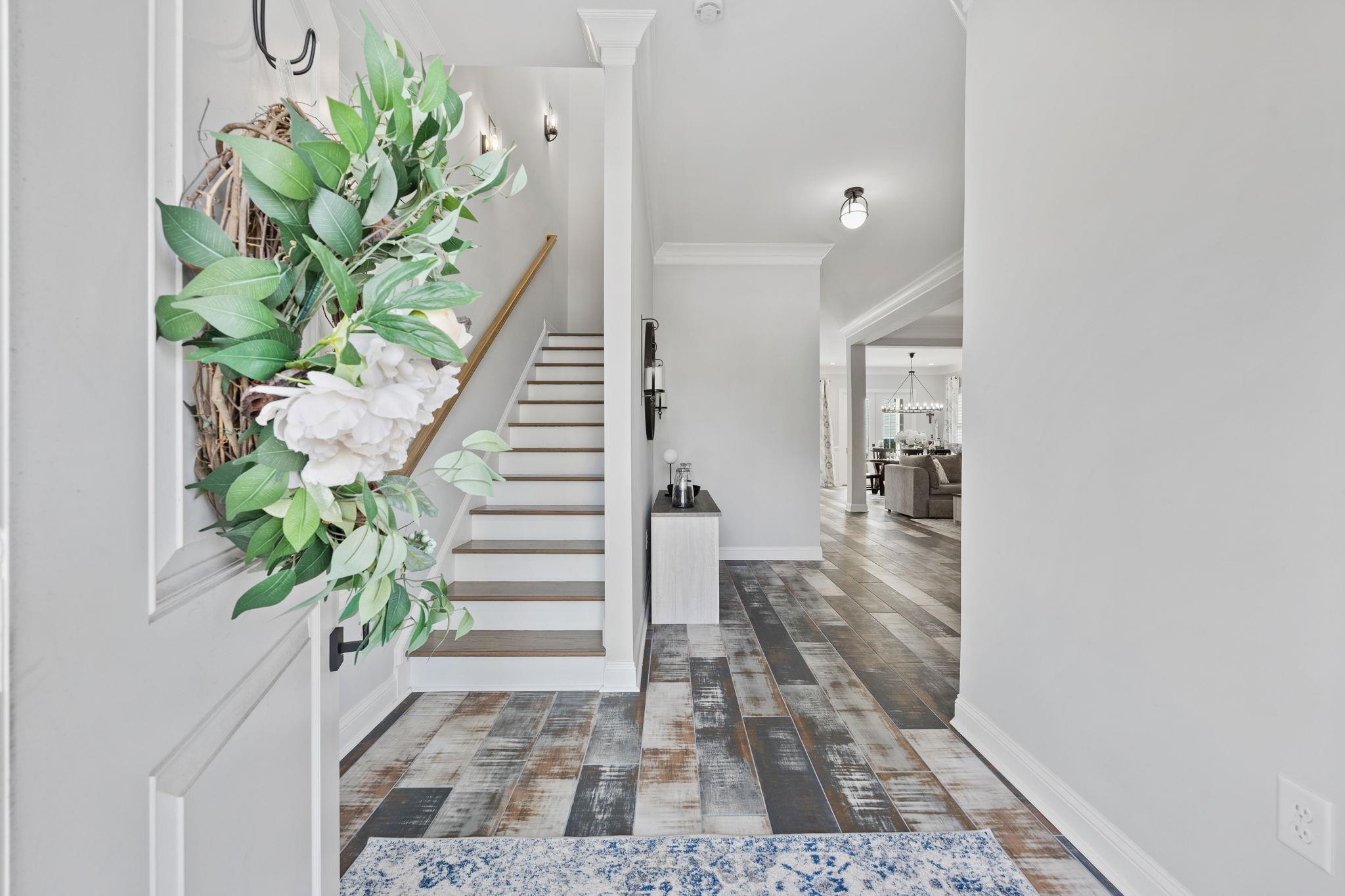 Image 2: Entryway with stairway, ornamental molding, dark w Image 2: Entryway with stairway, ornamental molding, dark w