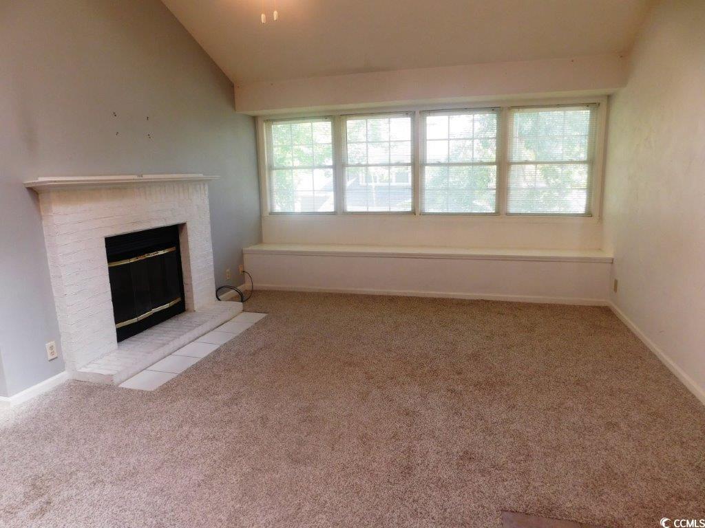 Image 4: Unfurnished living room featuring plenty of natura Image 4: Unfurnished living room featuring plenty of natura