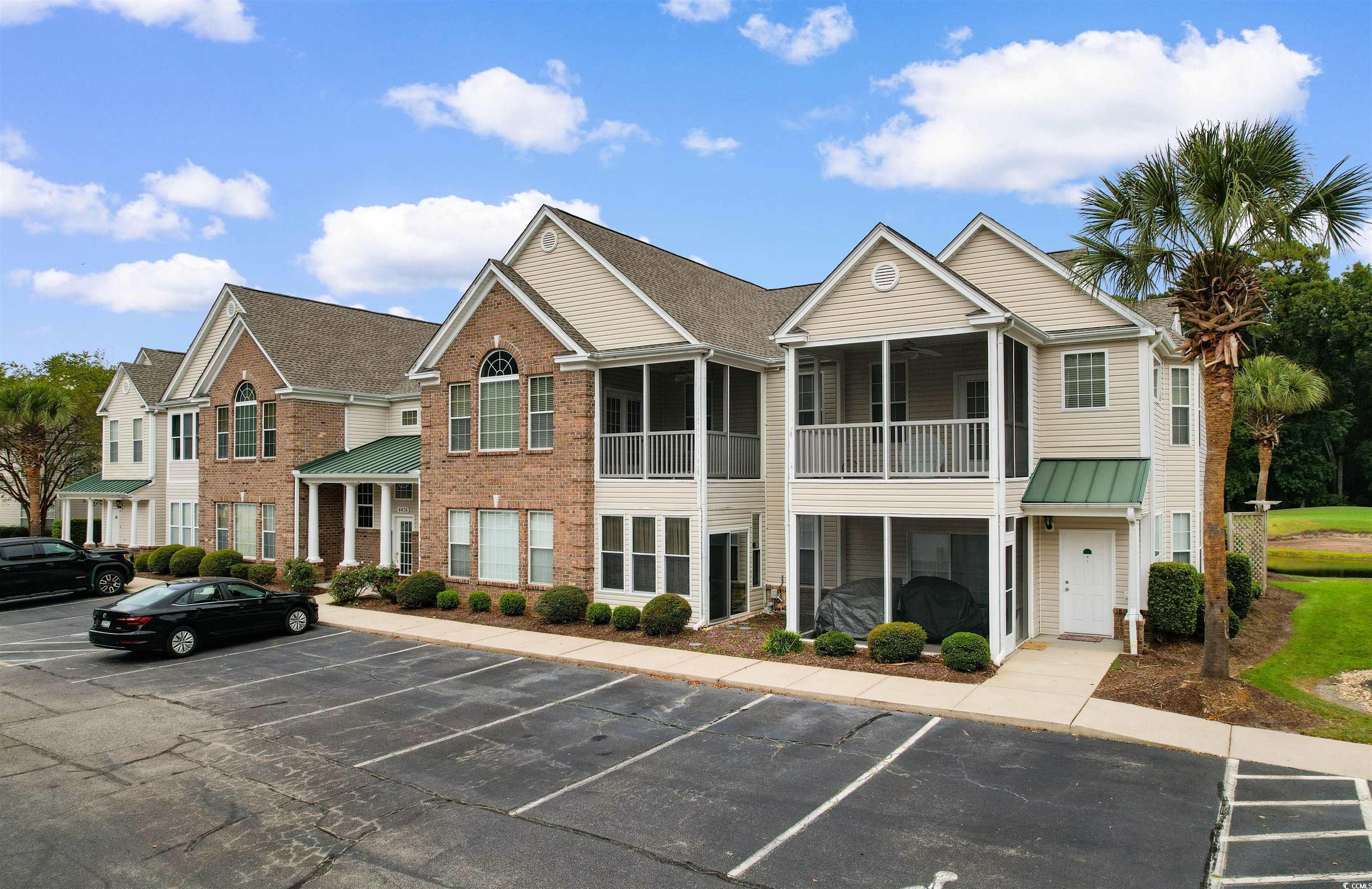 Image 2: View of property featuring uncovered parking