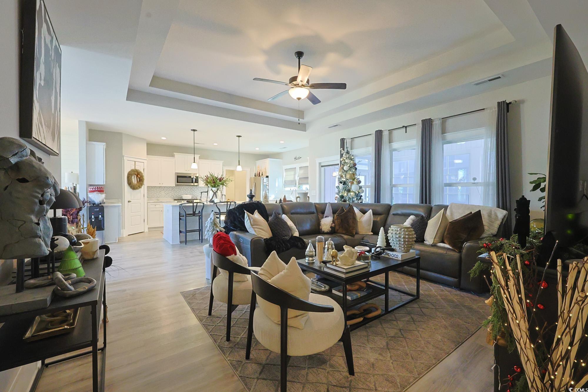 Image 4: Living area with light wood-style flooring, a tray Image 4: Living area with light wood-style flooring, a tray