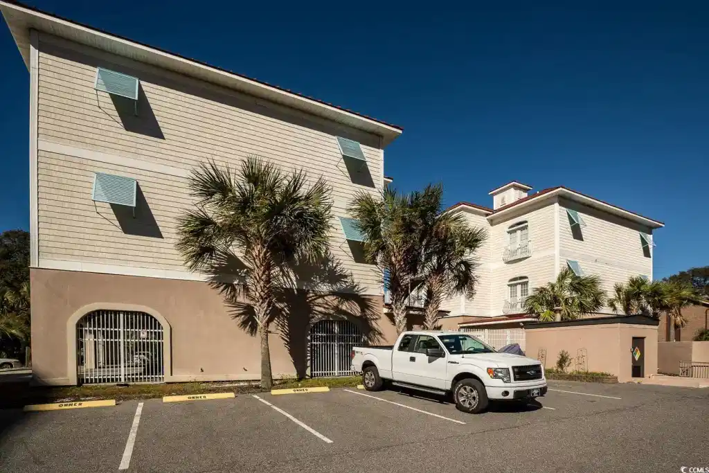 Image 1: View of property featuring uncovered parking Image 1: View of property featuring uncovered parking