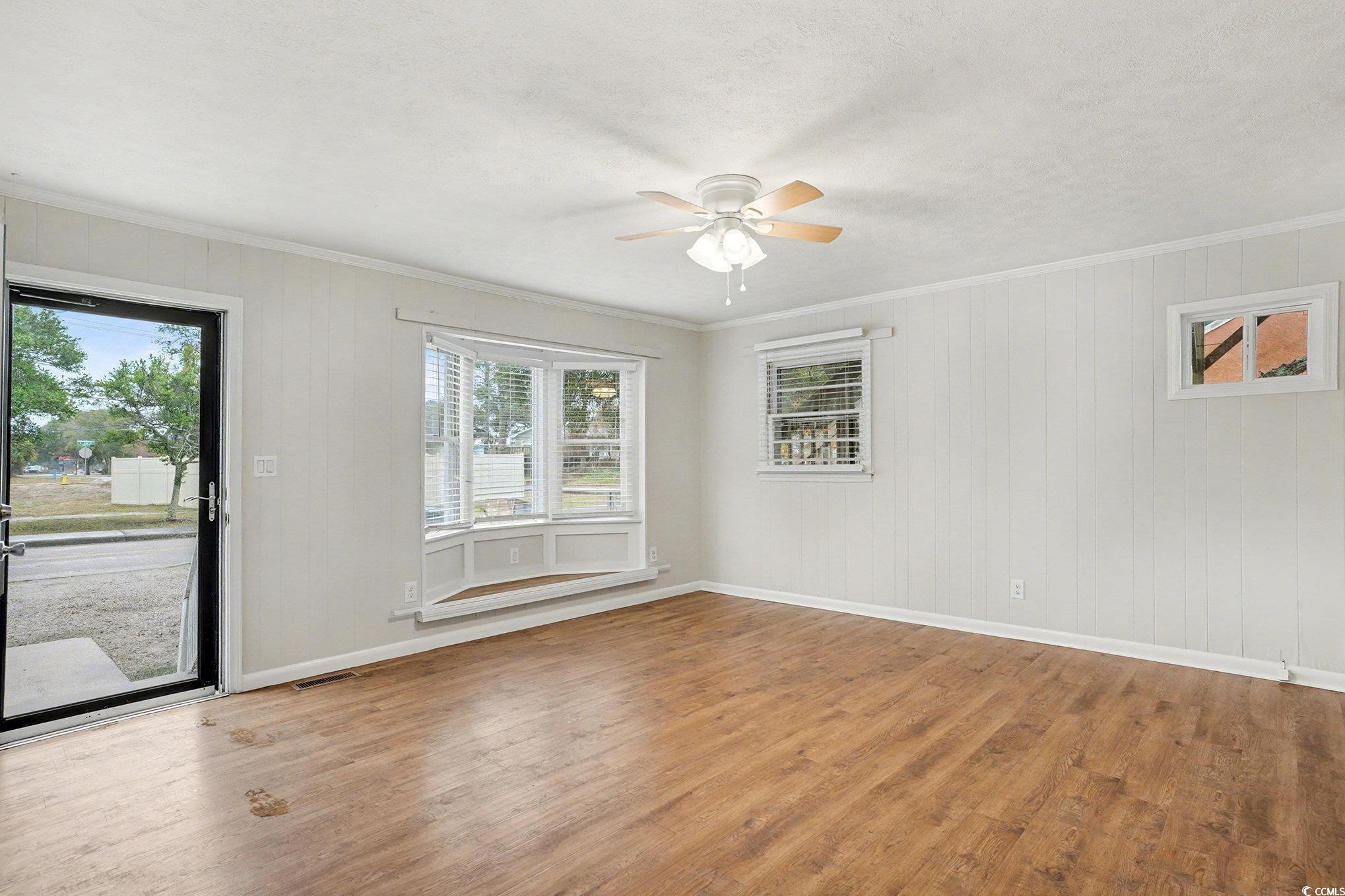 Image 4: Spare room featuring light wood-type flooring, orn Image 4: Spare room featuring light wood-type flooring, orn