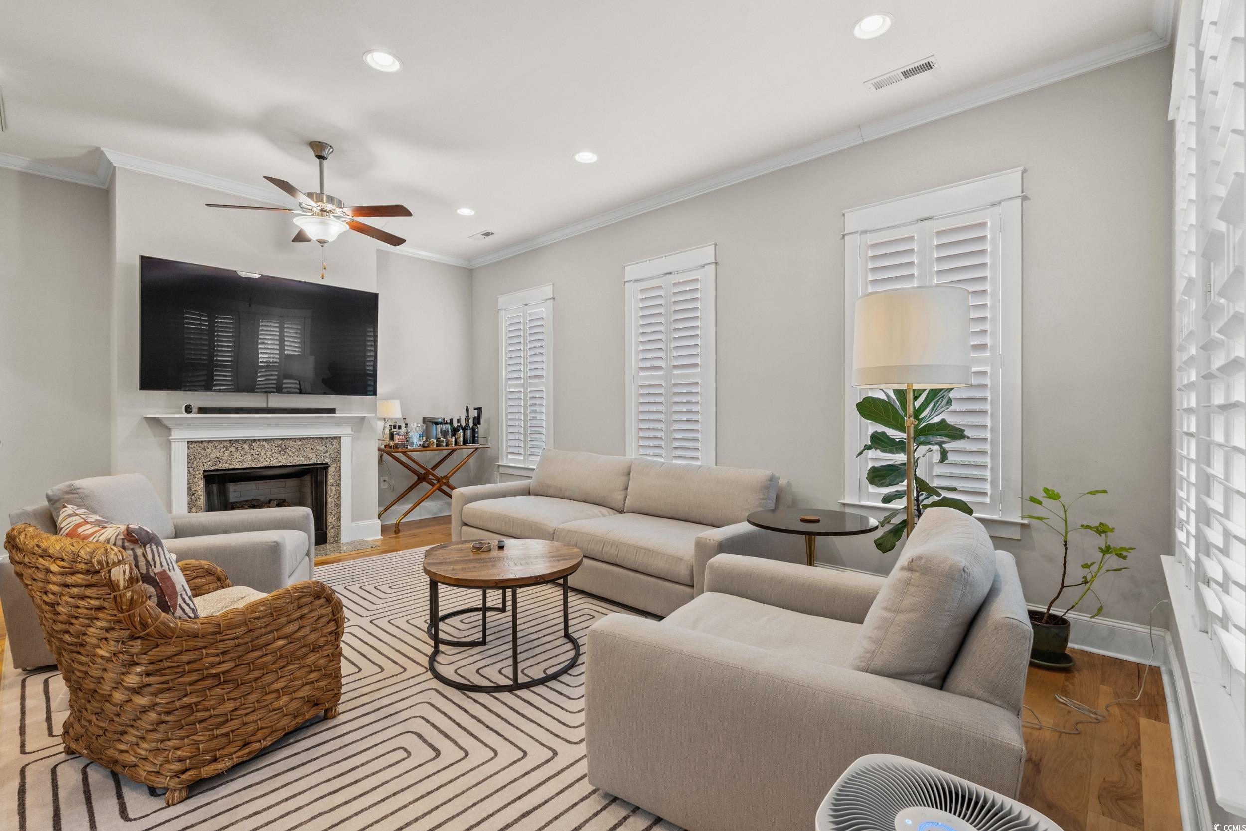Image 2: Living room featuring crown molding, recessed ligh Image 2: Living room featuring crown molding, recessed ligh