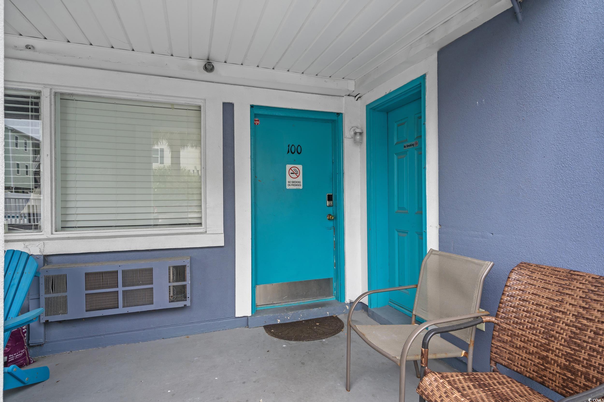 Image 4: Doorway to property with stucco siding Image 4: Doorway to property with stucco siding