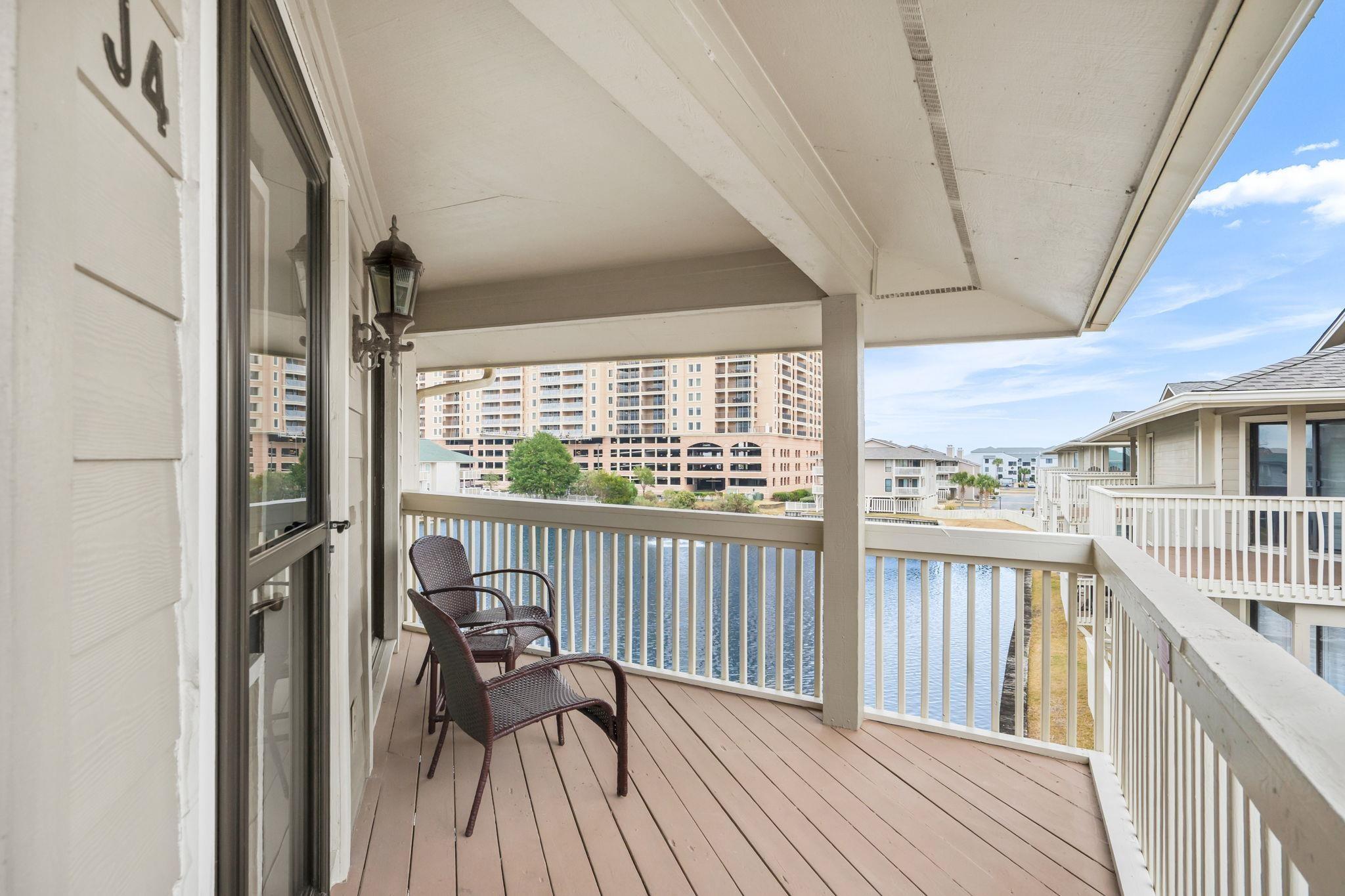 Image 3: Wooden terrace featuring a water view Image 3: Wooden terrace featuring a water view