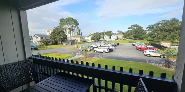 Image 3: Balcony featuring a residential view