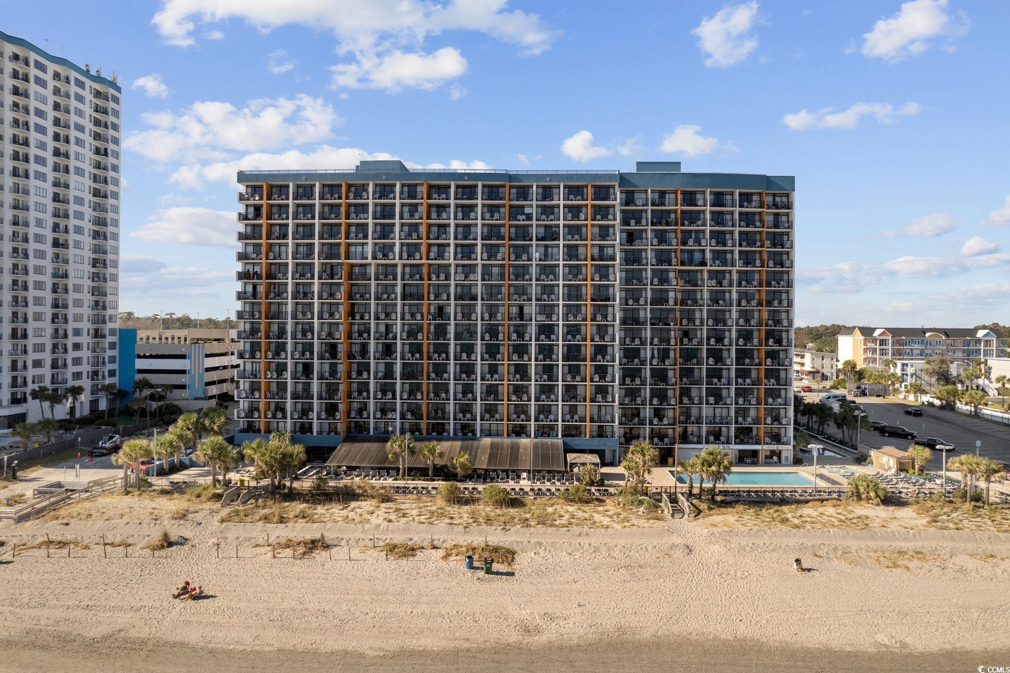 Image 2: View of the condo building from the beach Image 2: View of the condo building from the beach