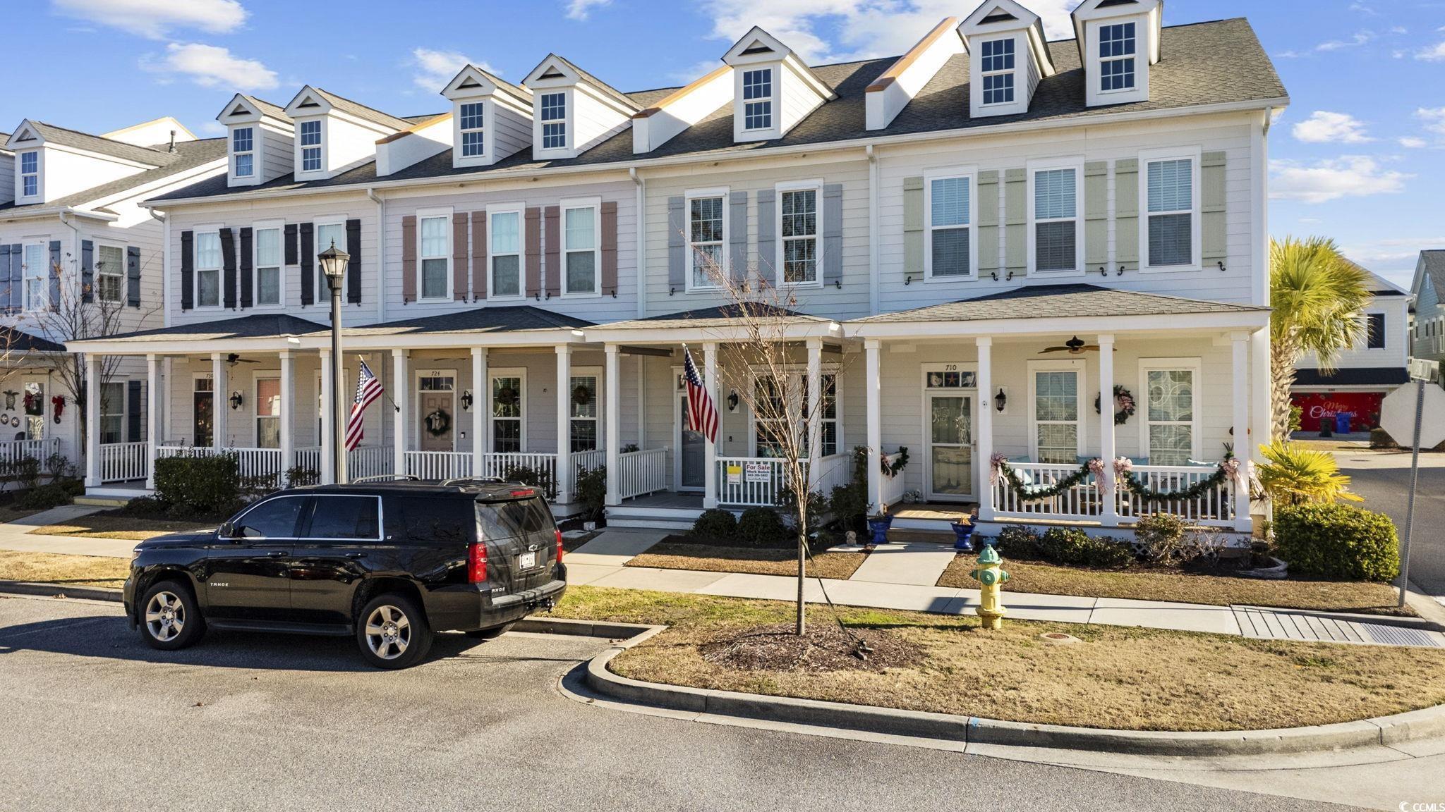 Image 2: View of front of home featuring a porch and a shin