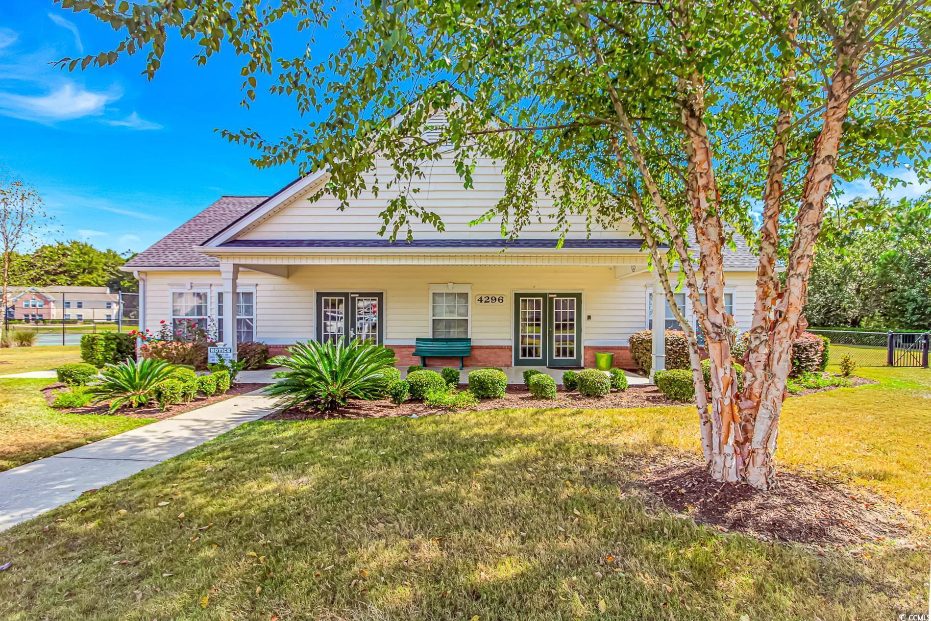 Image 3: Bungalow featuring covered porch, brick siding, an Image 3: Bungalow featuring covered porch, brick siding, an