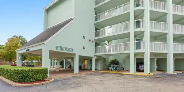 Image 2: View of apartment building / complex featuring cov Image 2: View of apartment building / complex featuring cov