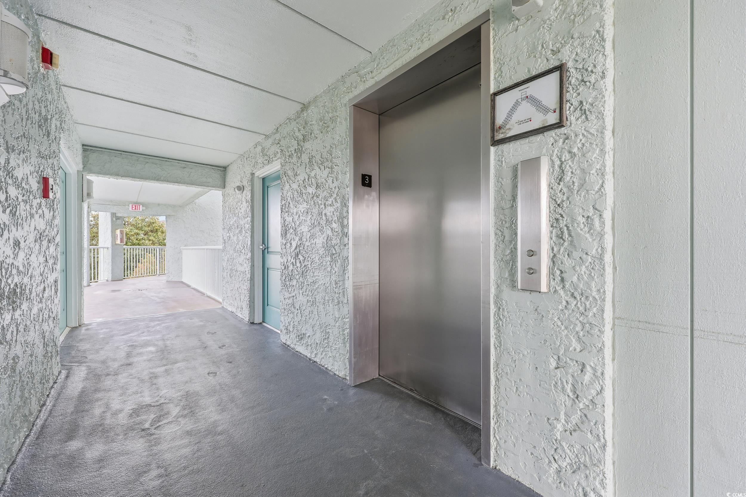 Image 3: Corridor featuring elevator and carpet Image 3: Corridor featuring elevator and carpet